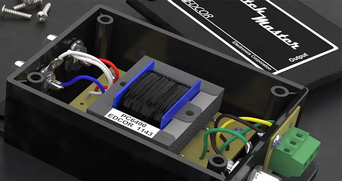 Black and silver electronic device with coiled wire, screws, and connectors.