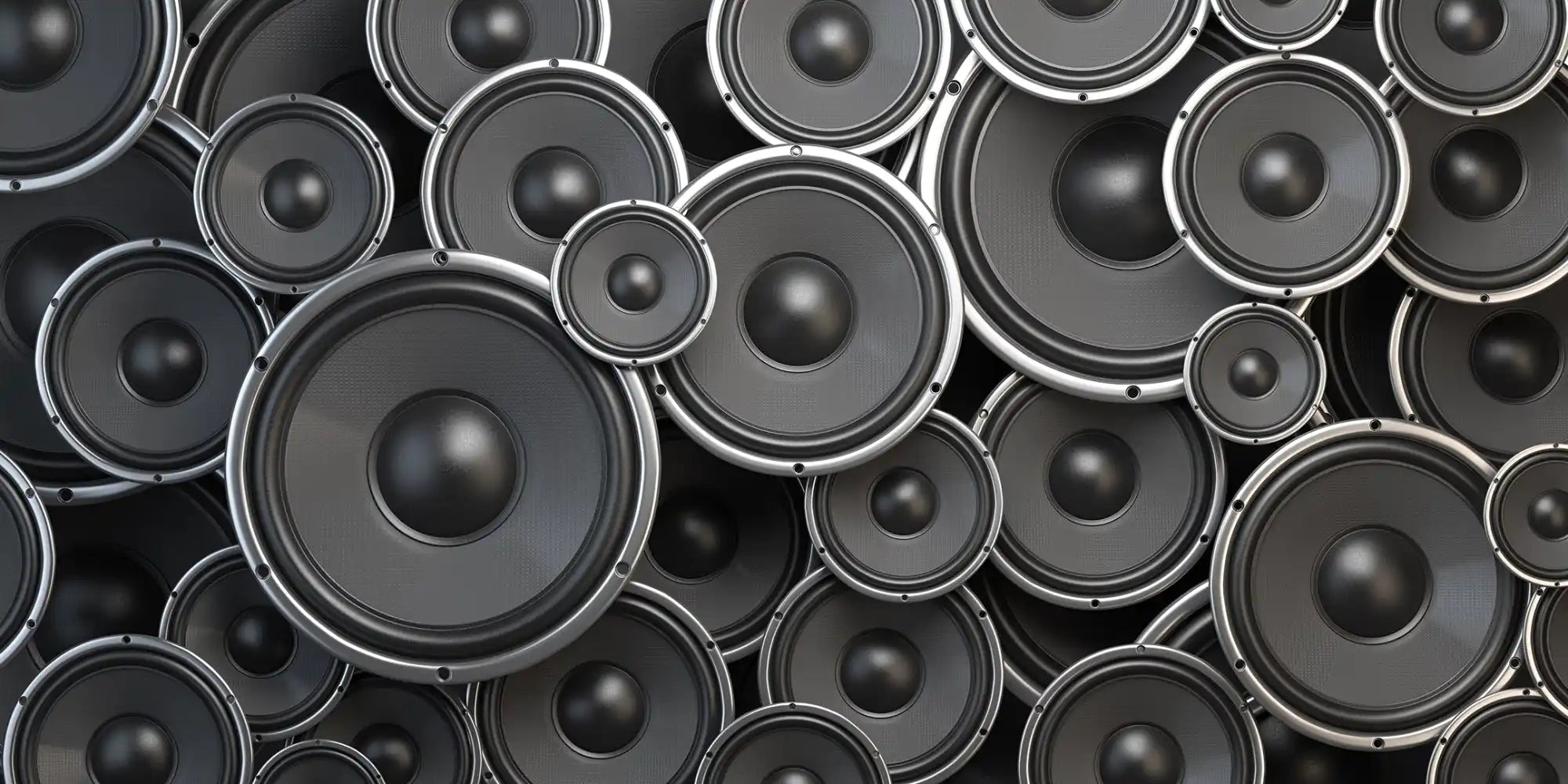 Black speaker wall design with silver rims and a glossy finish.